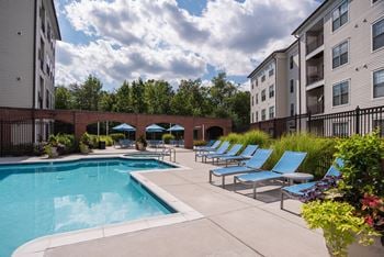 Relaxing pool area with sundeck